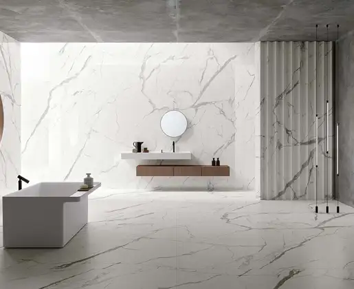 Statuario marble slab with bold grey veining on white surface
